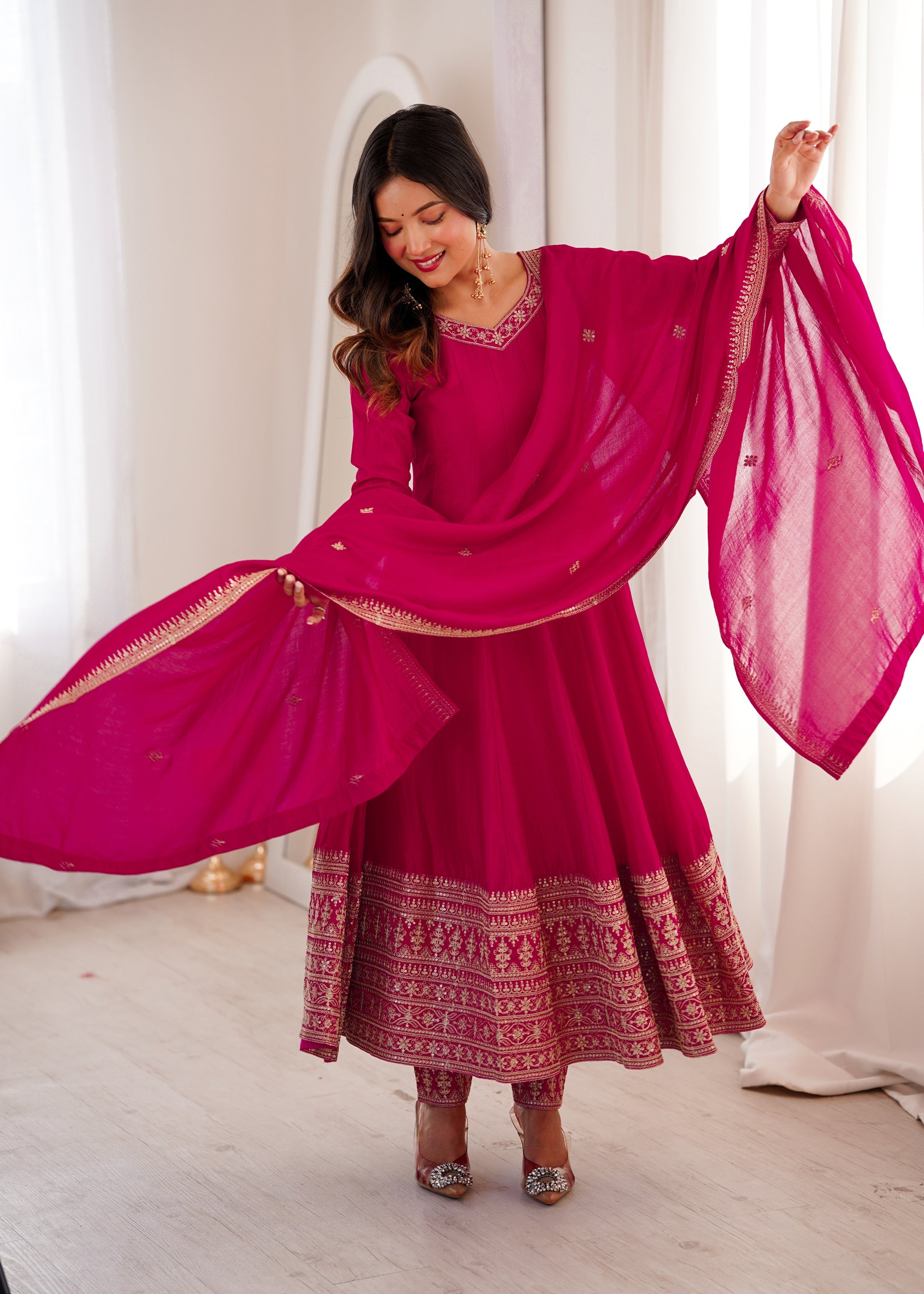 Ranipink Vichitra Silk Anarkali gown with embroidery, dori work, sequins, matching pants, and dupatta.