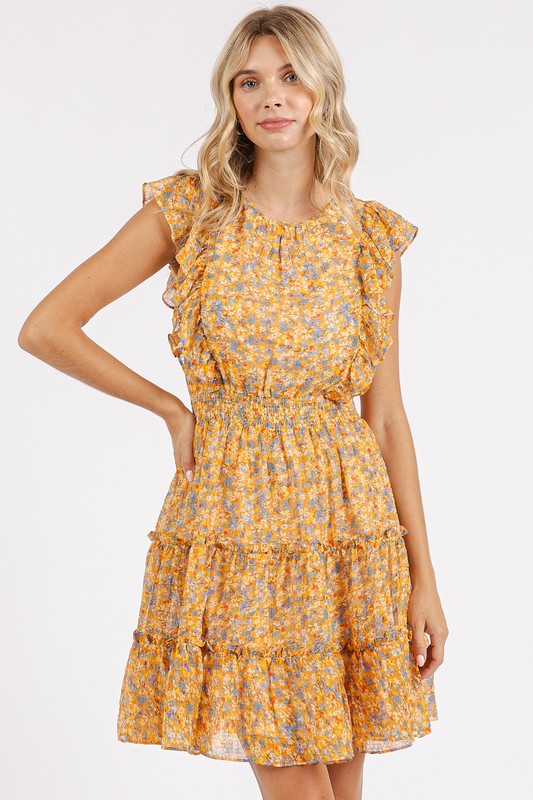 Playful ditsy floral print mini dress in chiffon with ruffle details.