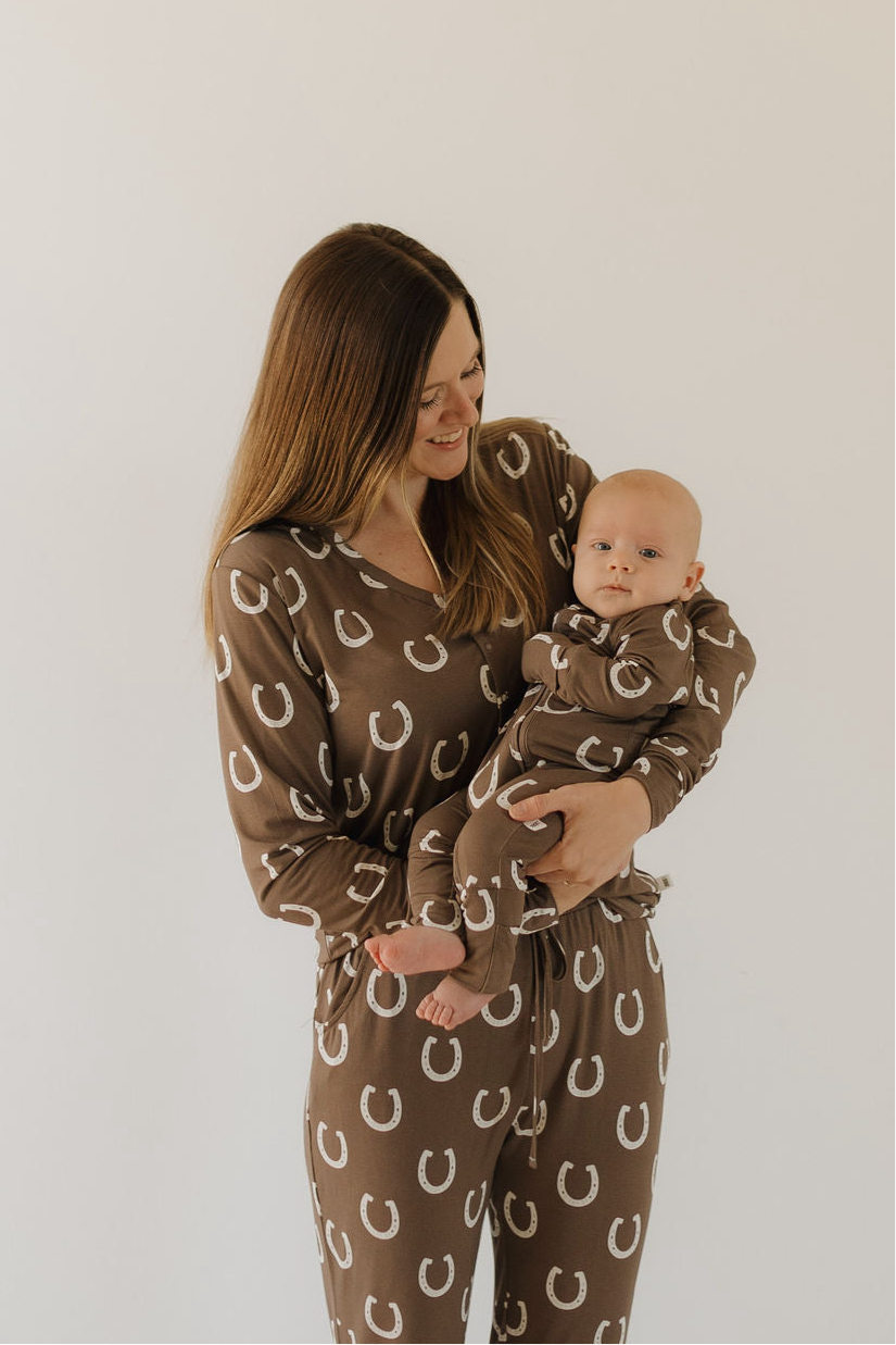 Women's long sleeve bamboo pajama set in brown and white print with button-down top and flare pants