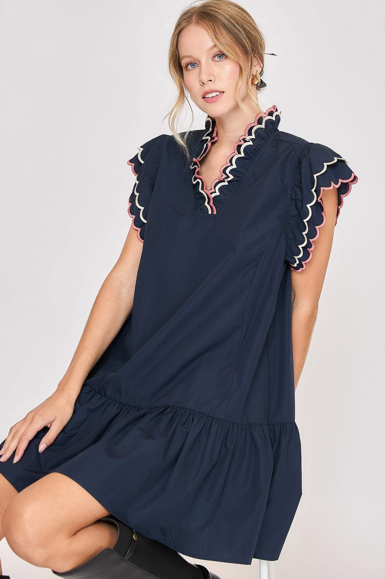 Dark navy cotton dress with feminine ruffled and scalloped sleeves