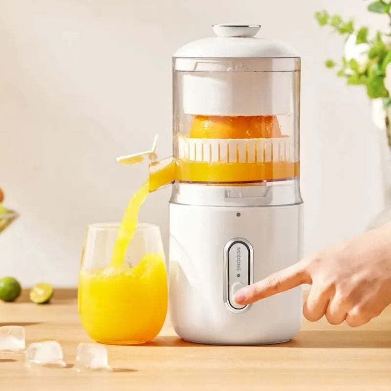 Portable wireless electric juicer in a compact design for orange and lemon extraction.