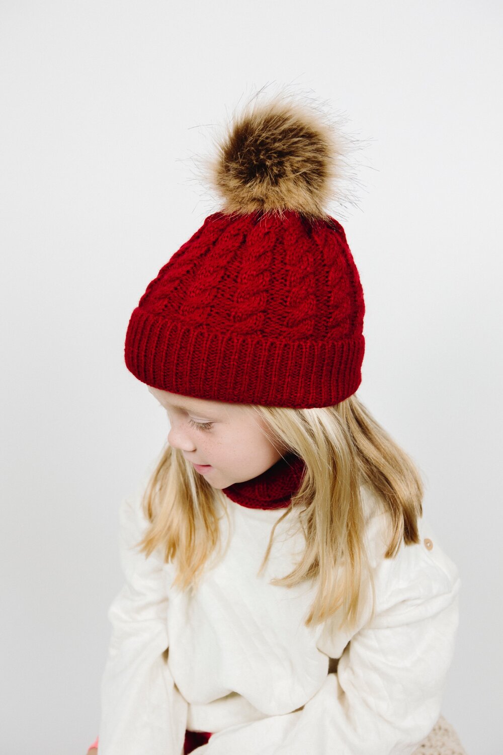 Hand-knitted beanie and neck wrap set