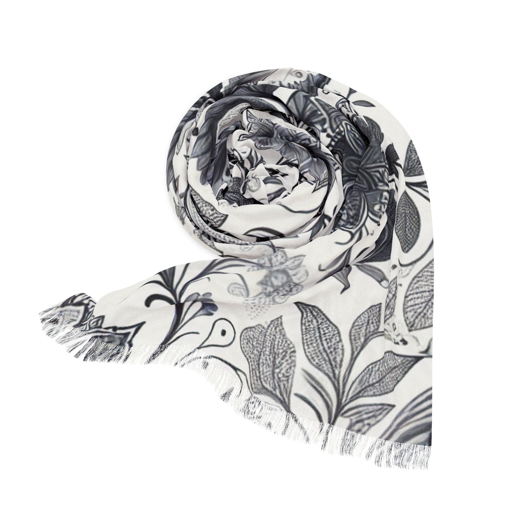 Elegant floral print lightweight fashion scarf draped over a shoulder, perfect for spring outfits.