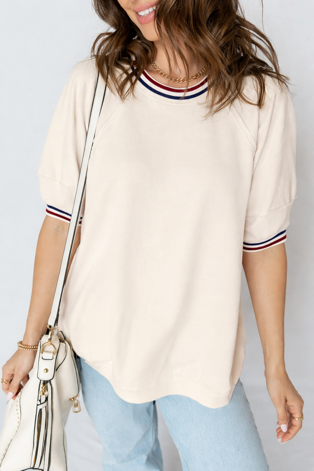 Haisley varsity sleeve loose tunic top in off-white, red, and navy-blue