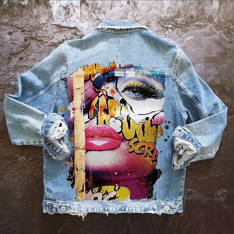 Harajuku style denim jacket for women featuring a bold, colorful pop-art face graphic on the back panel.