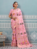 A luxurious light pink silk saree with a matching blouse piece