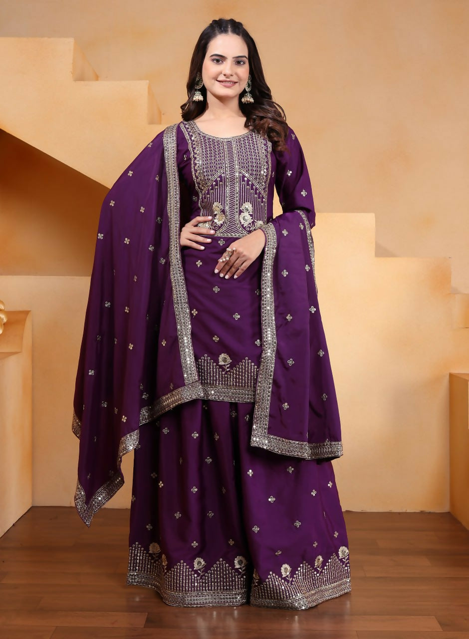 Wine-colored crepe embroidered kurti paired with matching sharara pants