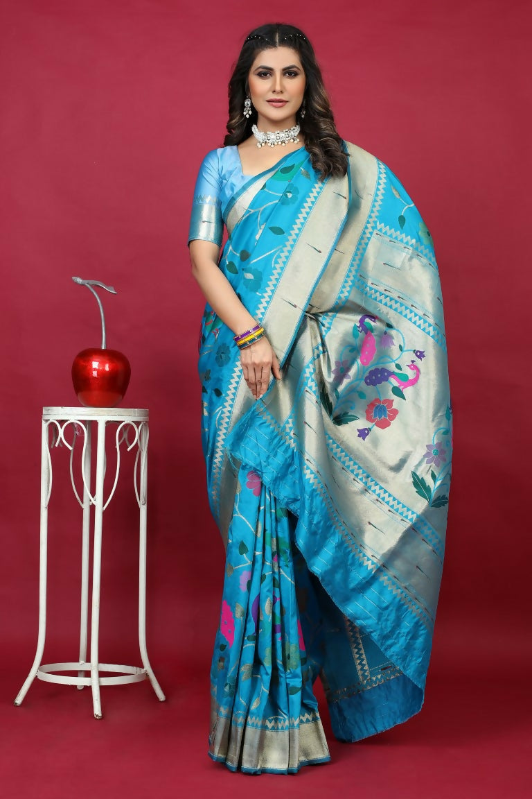 Sky blue Paithani silk saree featuring elegant gold zari woven patterns and matching blouse