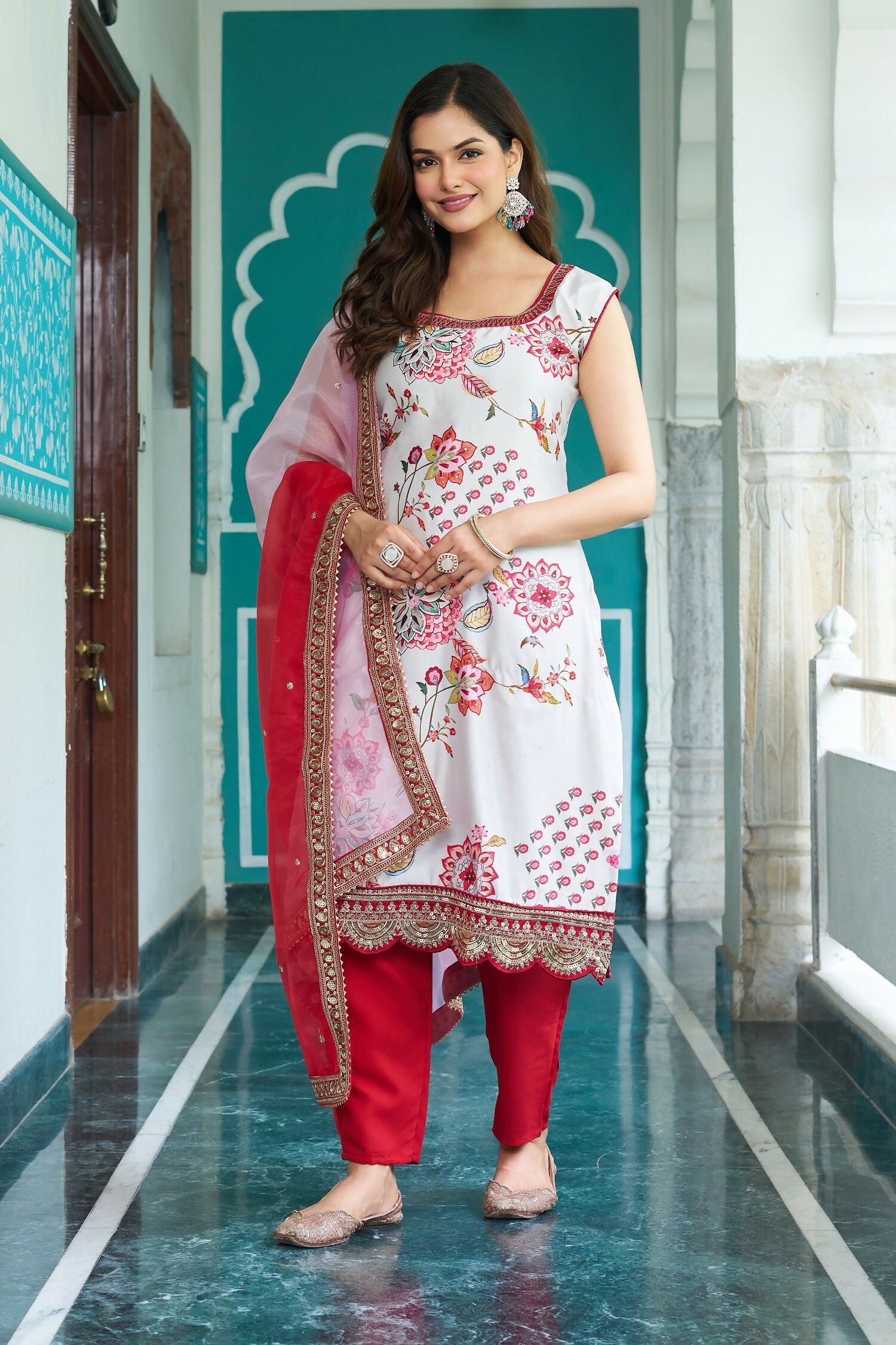 White georgette kurta set featuring elegant embroidery and subtle sequence work
