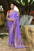 Dark lilac crepe chiffon Banarasi silk saree with a graceful, fluid drape.