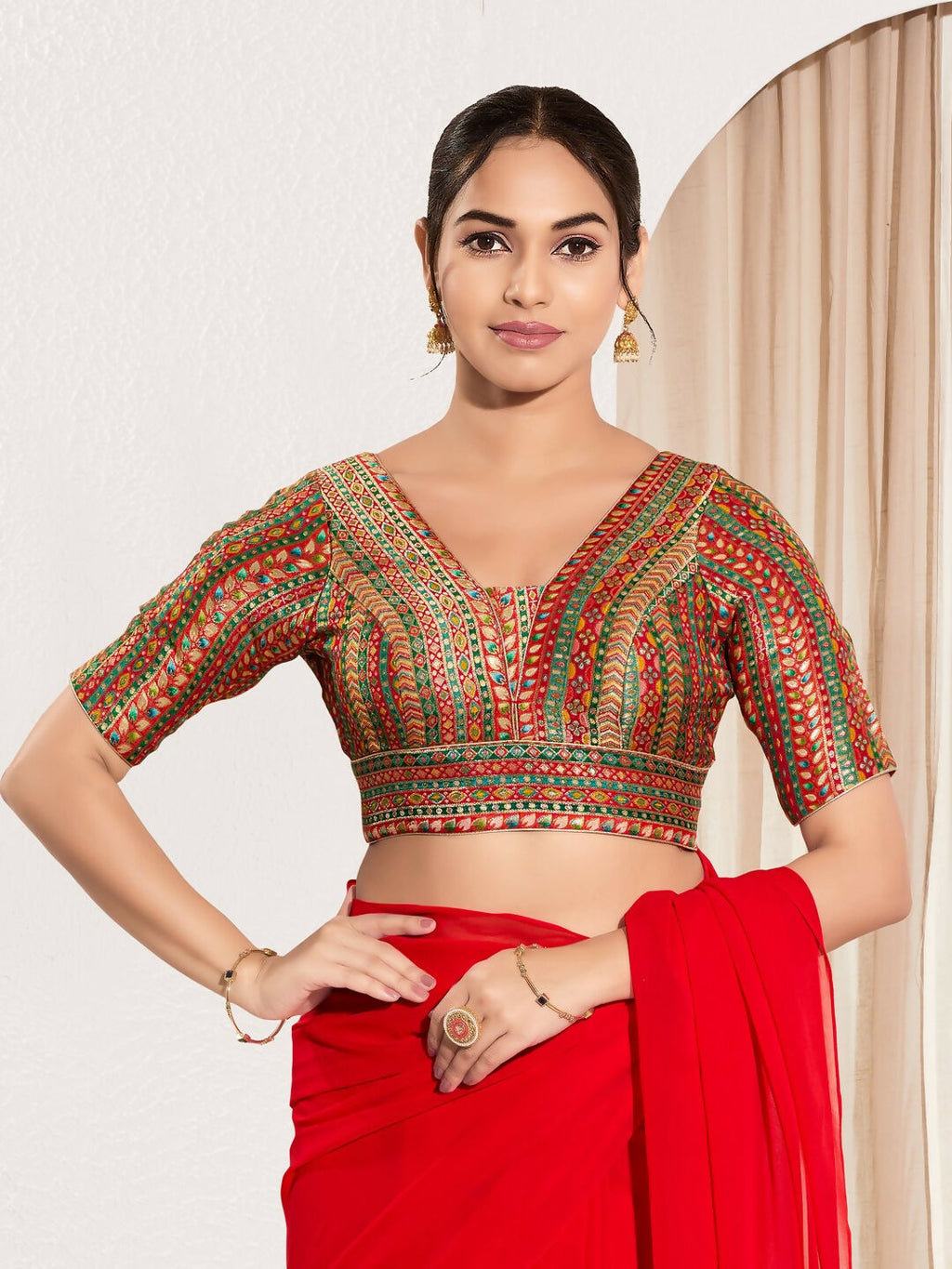 Red multi-color brocade padded blouse with V-neck and elbow sleeves