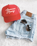 American Honey trucker hat in vibrant color with structured foam front and adjustable snapback closure.