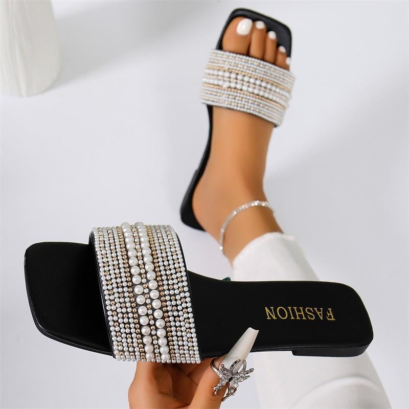 Modern women's glamorous diamond-embellished low block heel sandals in white, gold, and black