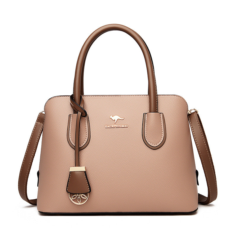 Spacious Leather Diaper Tote Bag with Crossbody Strap for Parents