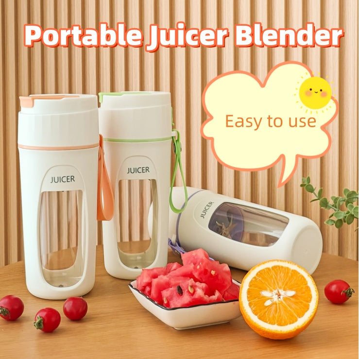 A modern minimalist portable electric blender in pastel green next to a neutral white countertop.