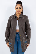 Woman wearing a distressed button up long sleeve jacket with a rugged finish