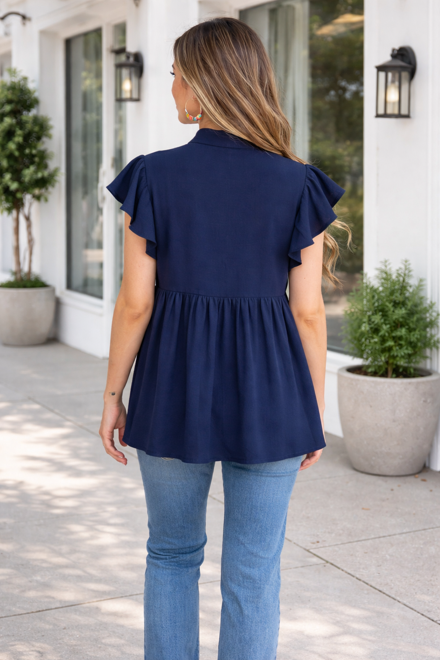 Embroidered Babydoll Blouse with Notched Neck and Ruffle Sleeves