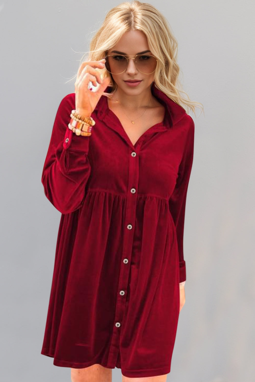 Deep red velvet mini dress with collar and long sleeves for a classic preppy look.
