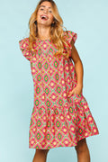 Vibrant geometric print ruffled cotton dress in pink, green, and yellow featuring side pockets.