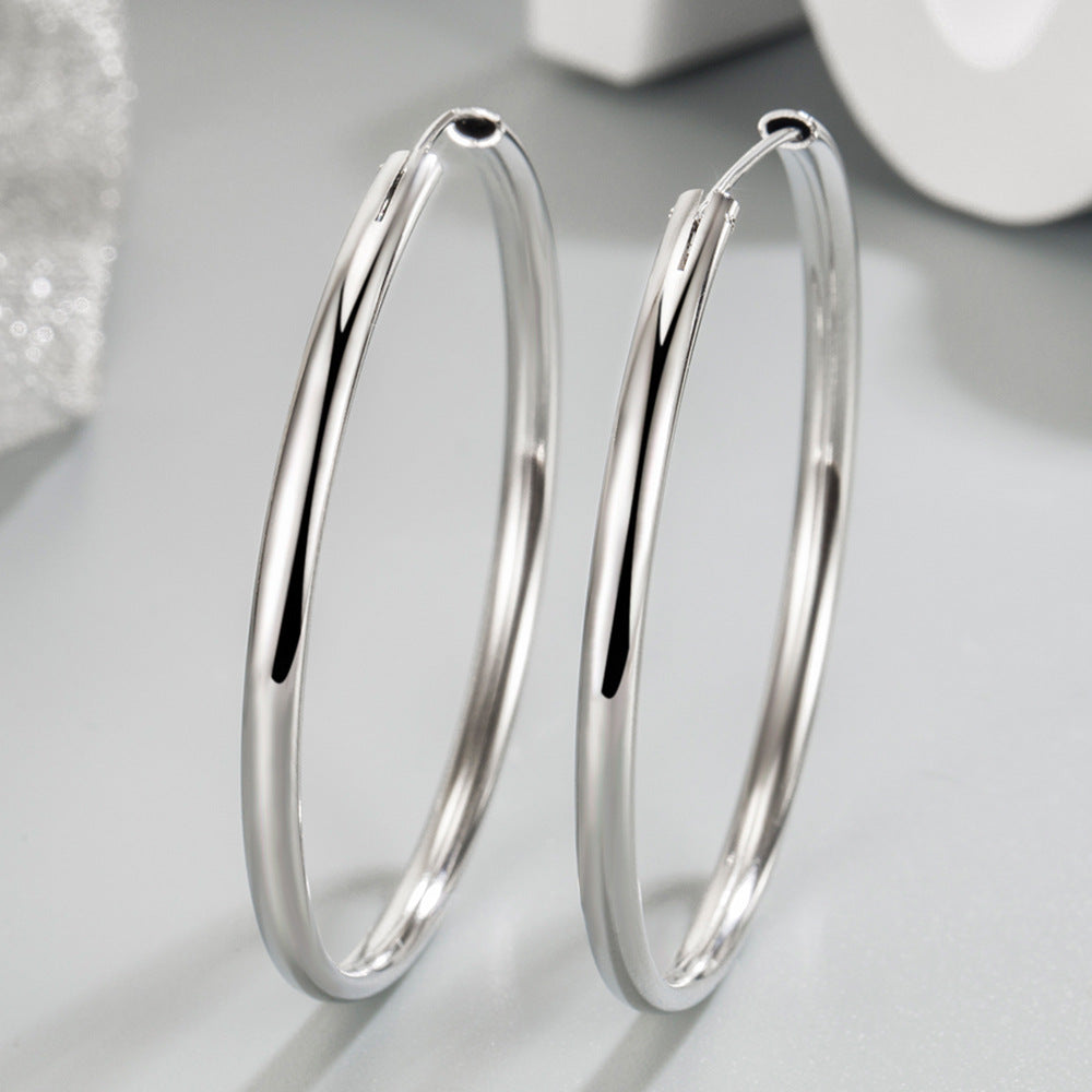 High-end silver-toned minimalist hoop stud earrings with a platinum-plated finish.