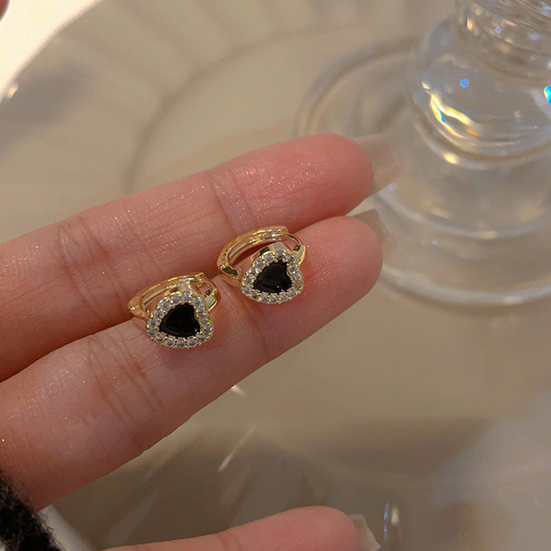 Vera Lux dainty gold heart stud earrings for women, featuring a minimalist everyday design.