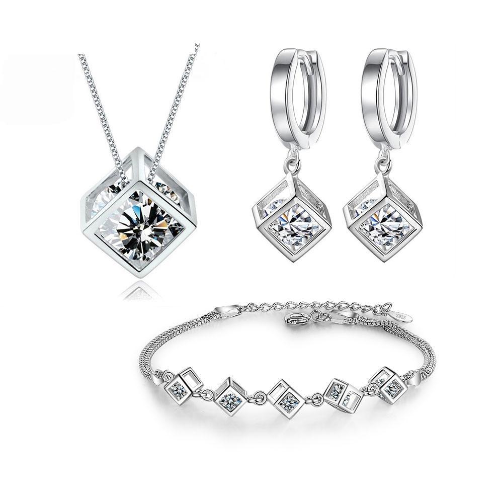 Stevvex luxury silver color jewelry set featuring square zircon cube pendant necklace, earrings, and bracelet.