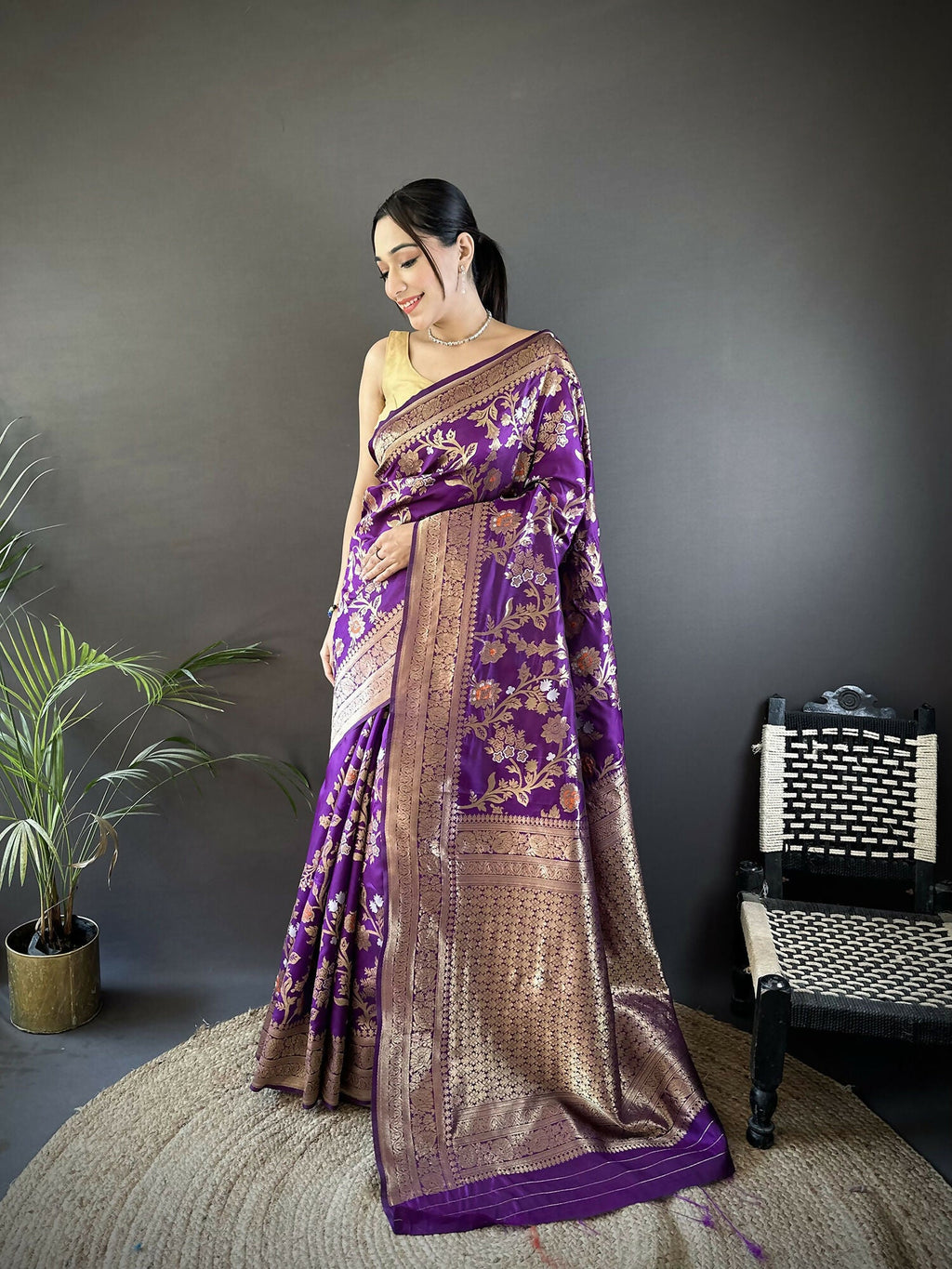Purple soft silk Banarasi saree featuring floral and ethnic Meenakari motifs