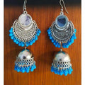Chandbali style jhumka earrings featuring blue pearls and reflective mirror work.