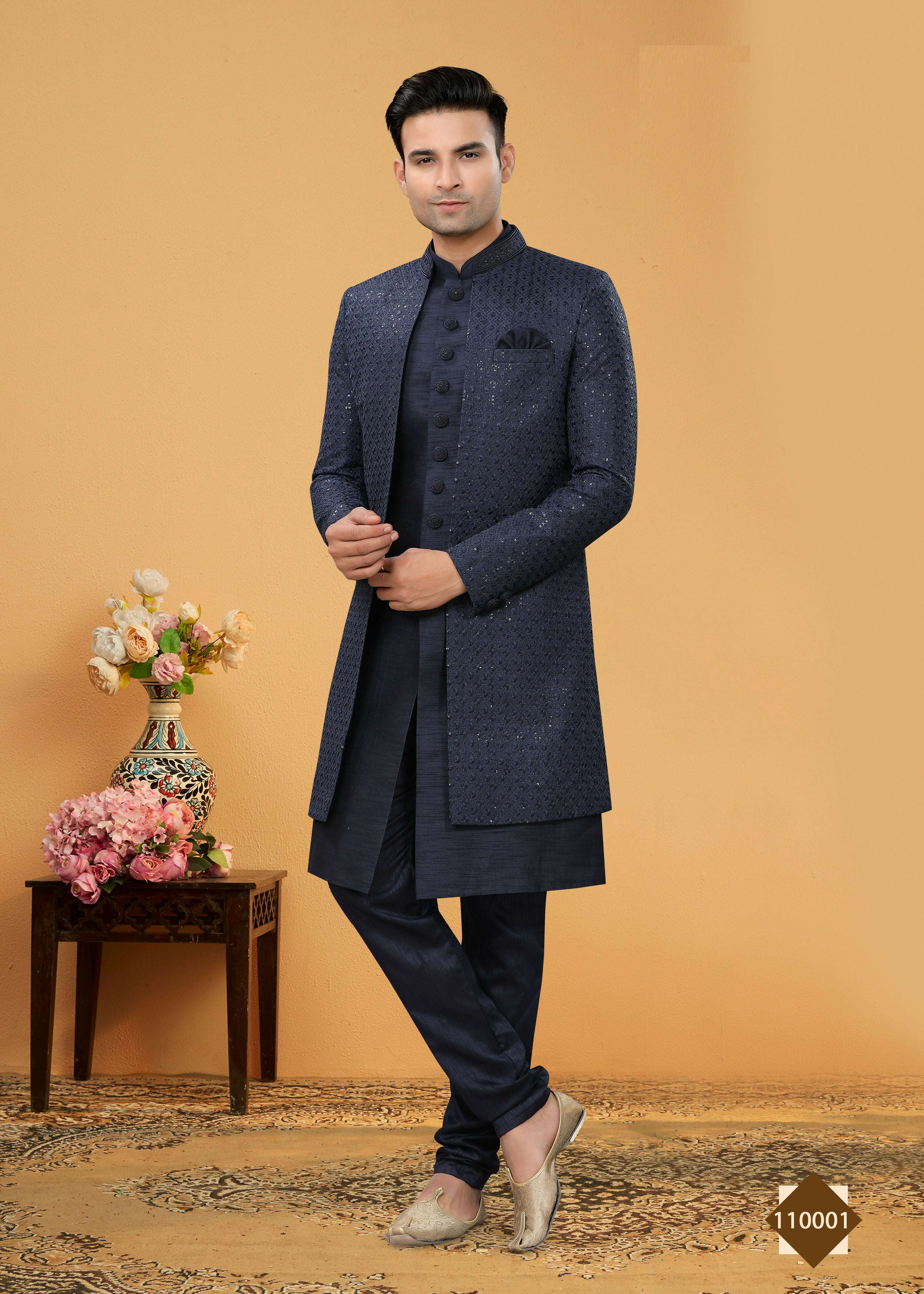 Men wearing a Navy Blue Art Silk straight kurta with Chinese collar and matching pyjama pants.