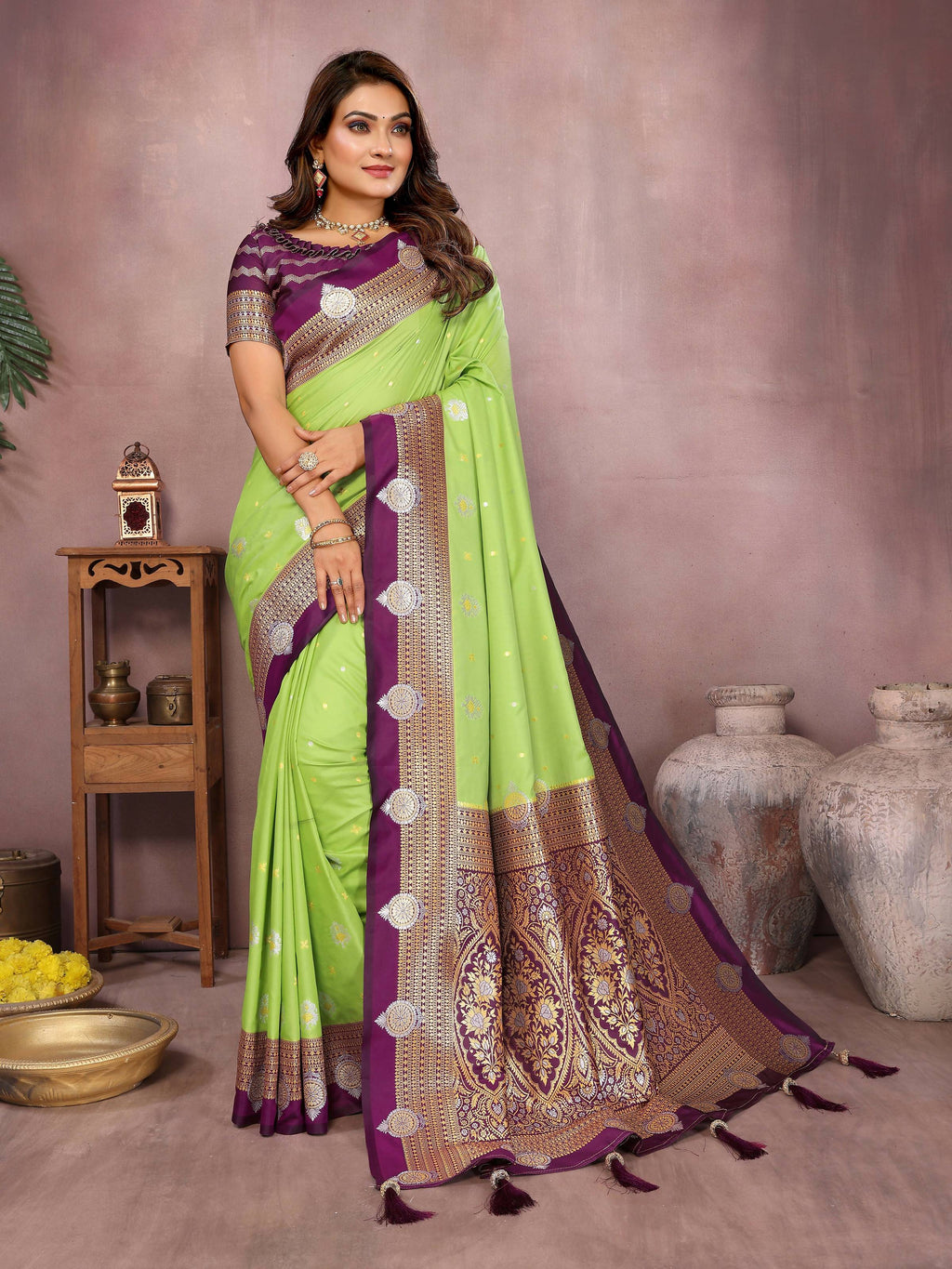 A bright parrot green silk saree featuring elegant woven patterns.