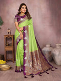 A bright parrot green silk saree featuring elegant woven patterns.