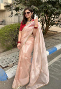 Peach crush tissue silk saree featuring intricate jacquard weaving on the blouse