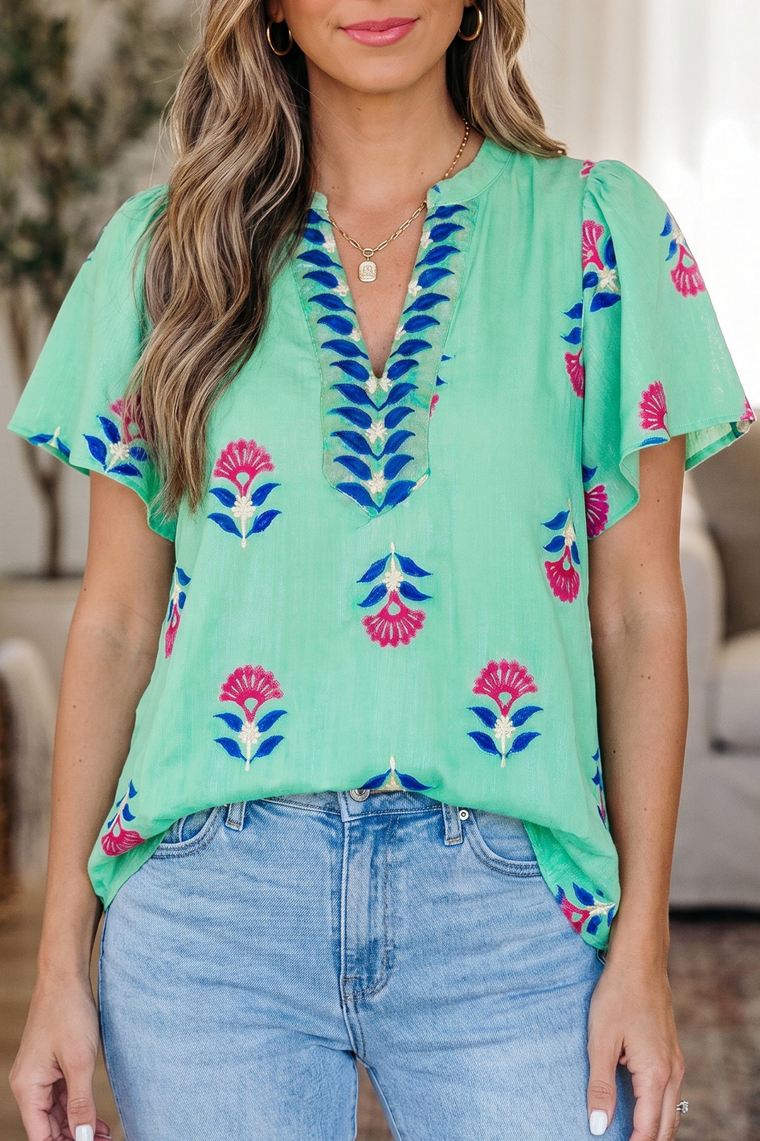 Gianna floral print blouse with flutter sleeves and V-neckline
