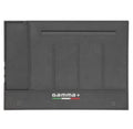 GAMMA+ Magnetic Mat Station Organizer holding barber clippers on a salon counter