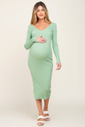 Mint green ribbed knit maternity midi dress with long sleeves and a wide v-neckline