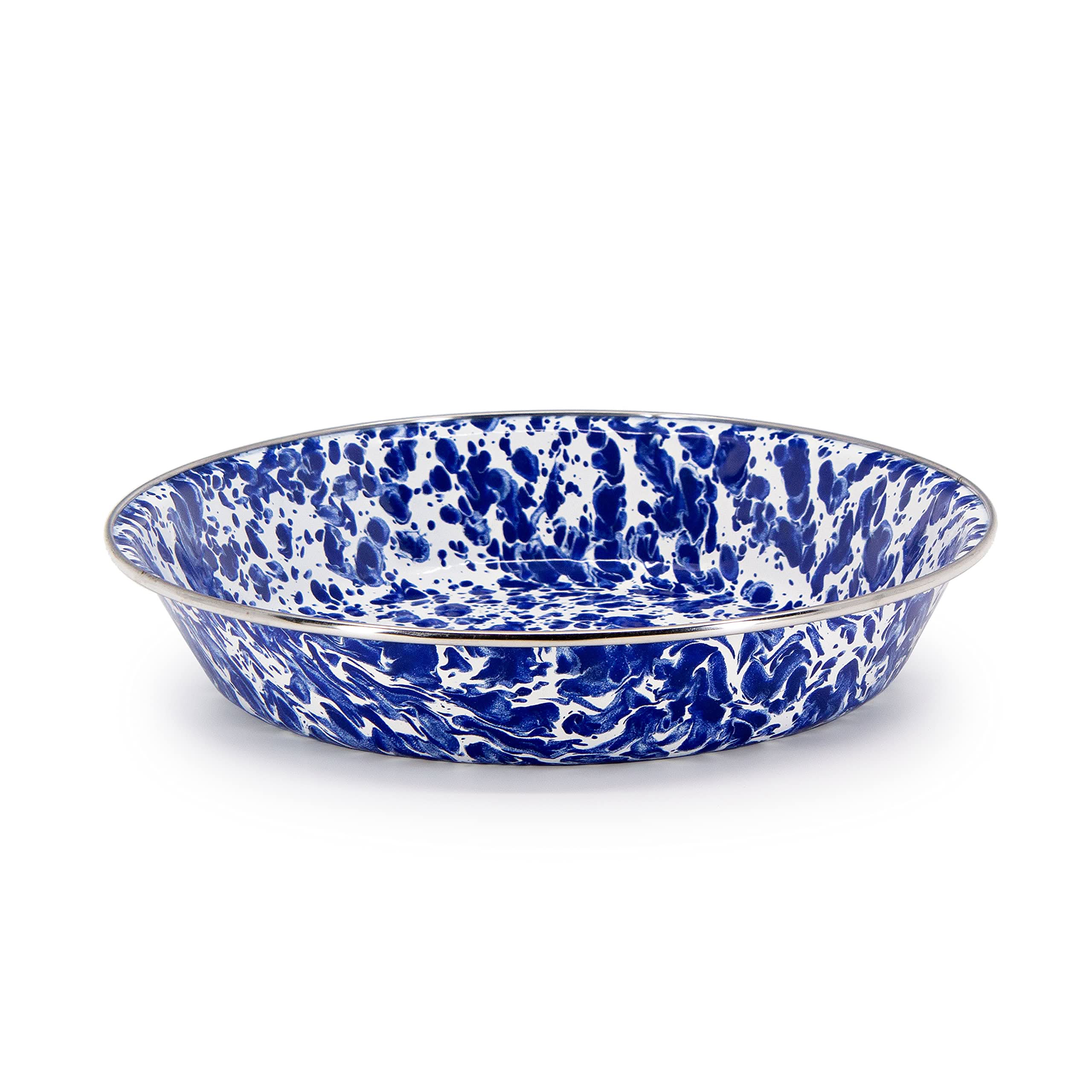 A 10-inch classic spatterware enamelware pie plate on a rustic wooden table.