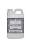 64 oz bottle of Portfolio Laundry Wash featuring elegant white and grey labeling