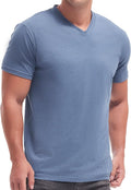 A man wearing a premium fitted modern V-neck t-shirt in a neutral color, showcasing the form-fitting cut.