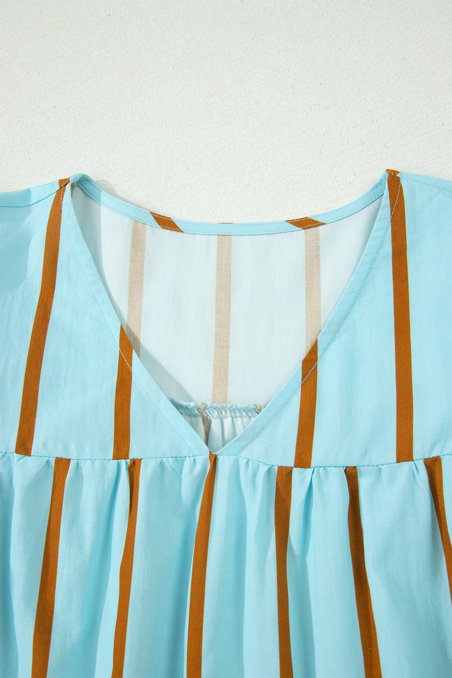 Malaysia Ruffled Short Sleeve Blouse in Light-Blue and Brown