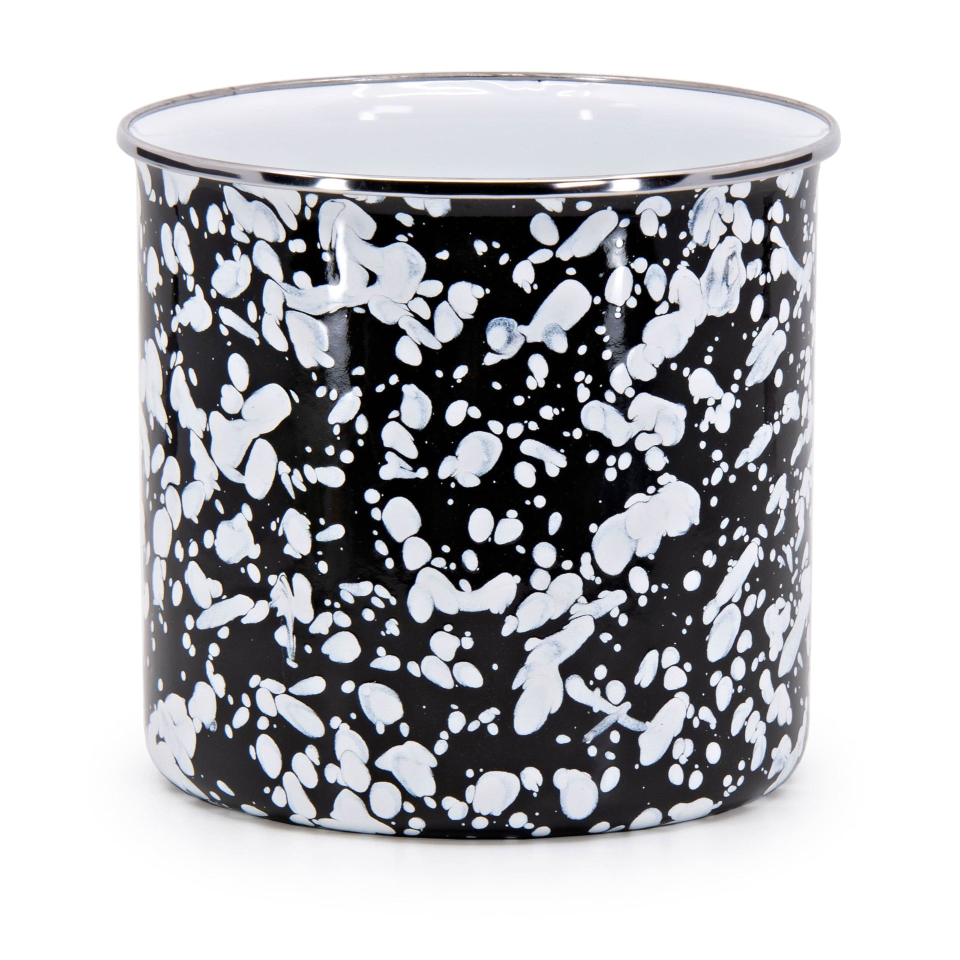 Black Swirl enamelware utensil holder with stainless steel trim on a kitchen countertop.