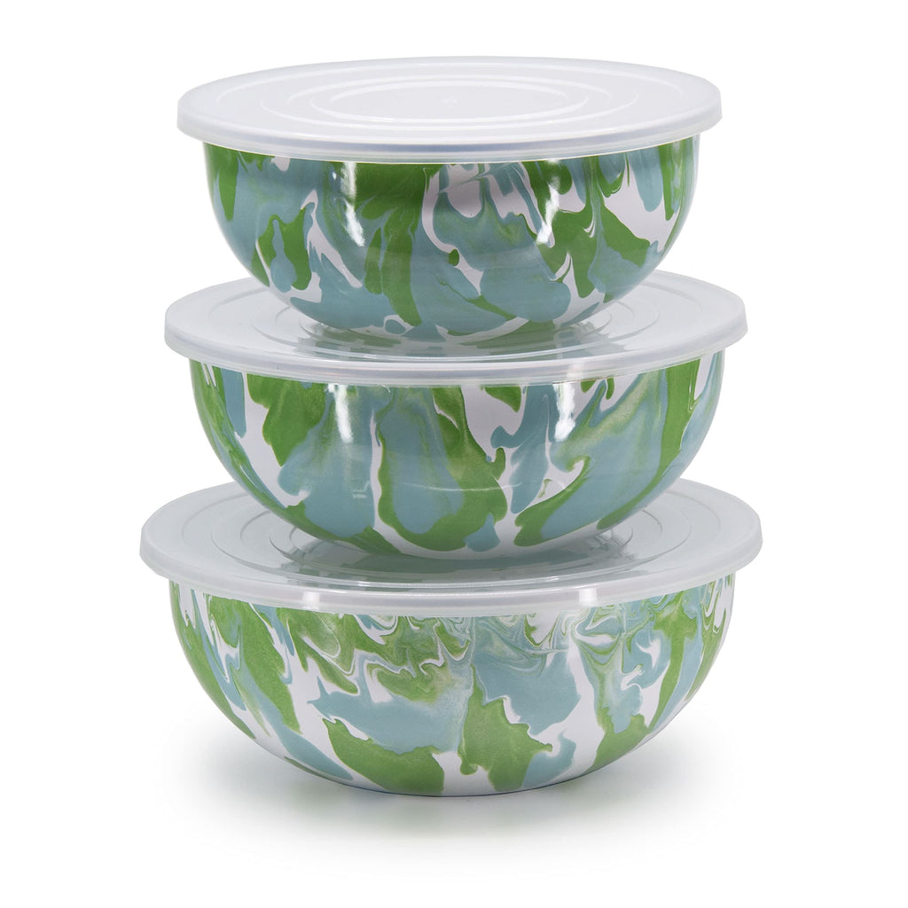 Set of 3 Golden Rabbit enamelware mixing bowls in marbleized lime green, teal, and white on a kitchen counter.