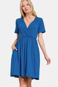 Surplice neckline dress in soft brushed DTY fabric with short sleeves.