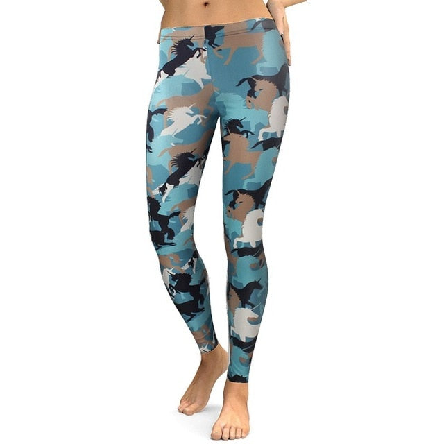 Full-length image of a model wearing vibrant blue, brown, black, and white horse silhouette camouflage print leggings.