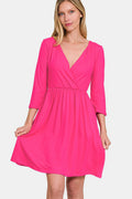 Fuchsia three-quarter sleeve surplice mini dress with pockets