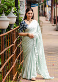 Blue poly silk saree with intricate mango woven motifs and fancy cutwork border