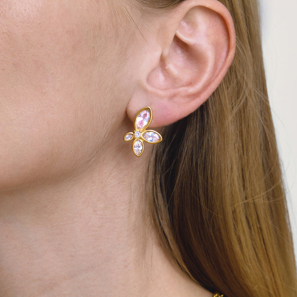 Pair of elegant White Flower Zircon Stud Earrings with polished stainless steel petals