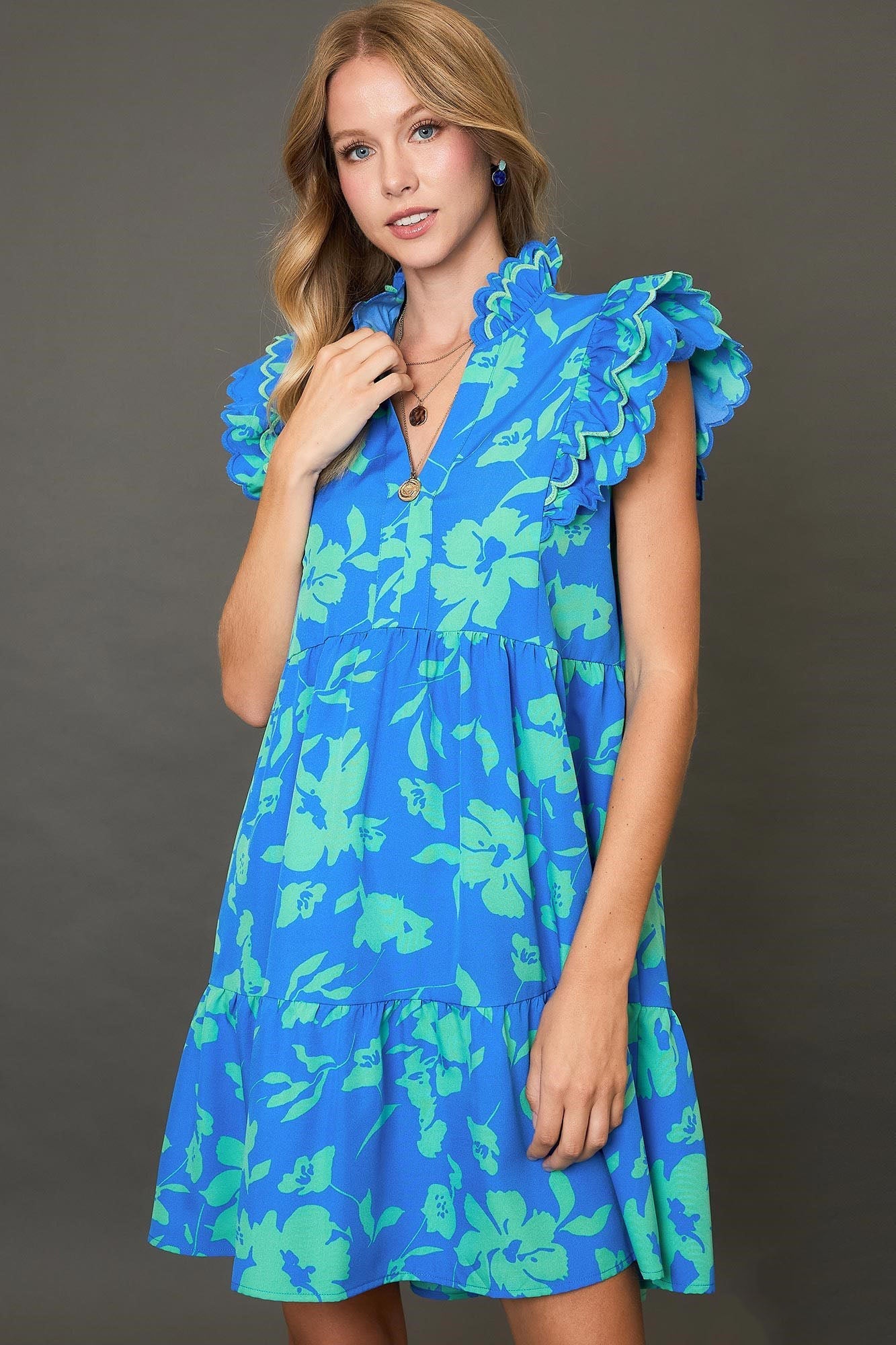 Blue and green floral print mini dress with ruffle cap sleeves