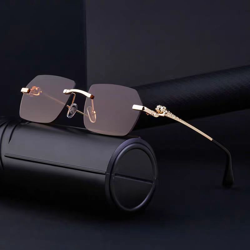 Gold rimless sunglasses with cheetah print rim detail in hip-hop street style