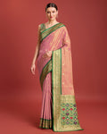 Rose Pink Banarasi tissue silk saree with traditional Patola pallu and zari details.