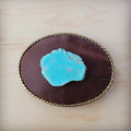 Rope edge brown leather belt buckle with a center blue turquoise stone